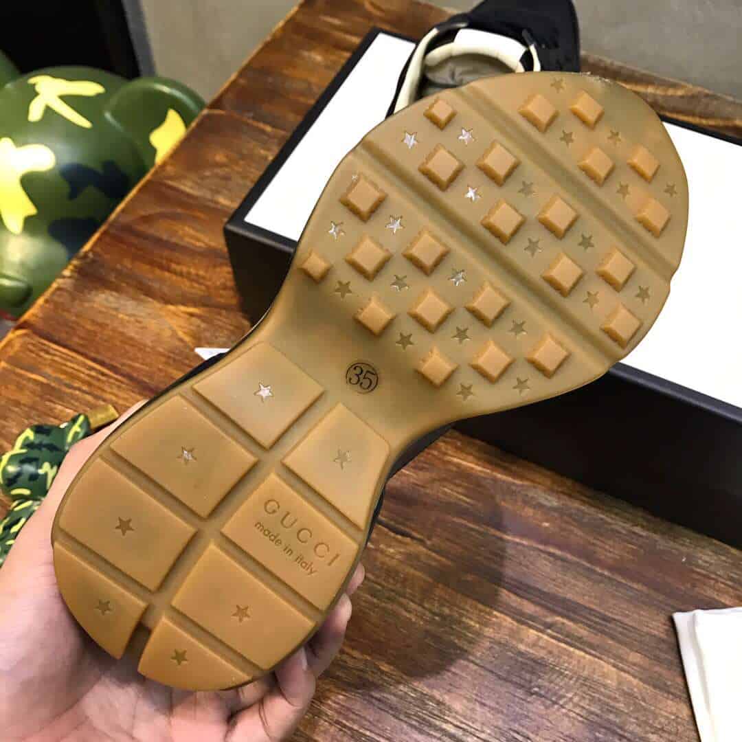 GUCCI RHYTON LEATHER SNEAKER WITH GUCCI LOGO