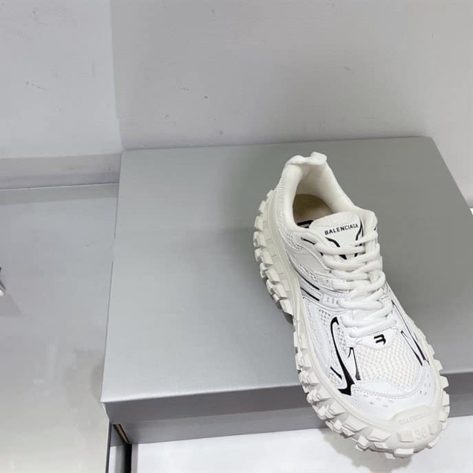 BALENCIAGA MEN'S DEFENDER TRAINERS - BB225