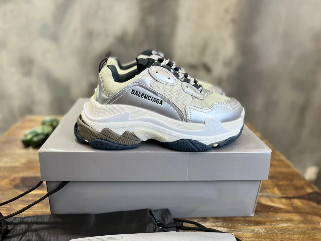 BALENCIAGA WOMEN'S TRIPLE S SNEAKER IN BLACK/WHITE/SILVER - BB256