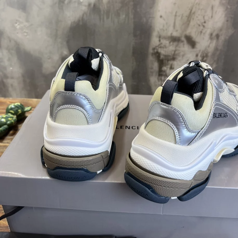 BALENCIAGA WOMEN'S TRIPLE S SNEAKER IN BLACK/WHITE/SILVER - BB256