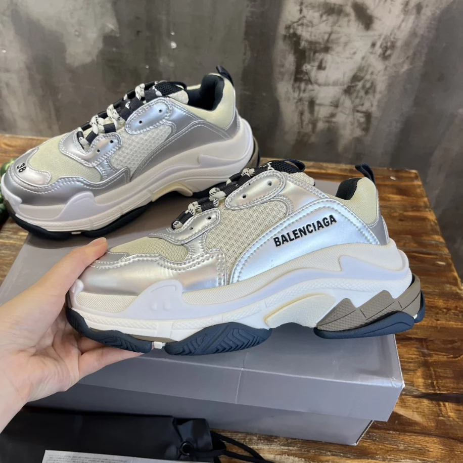 BALENCIAGA WOMEN'S TRIPLE S SNEAKER IN BLACK/WHITE/SILVER - BB256