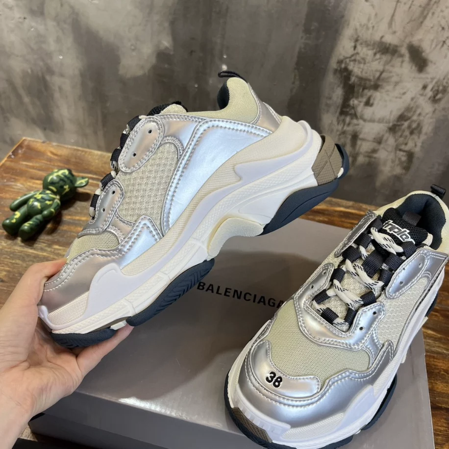 BALENCIAGA WOMEN'S TRIPLE S SNEAKER IN BLACK/WHITE/SILVER - BB256