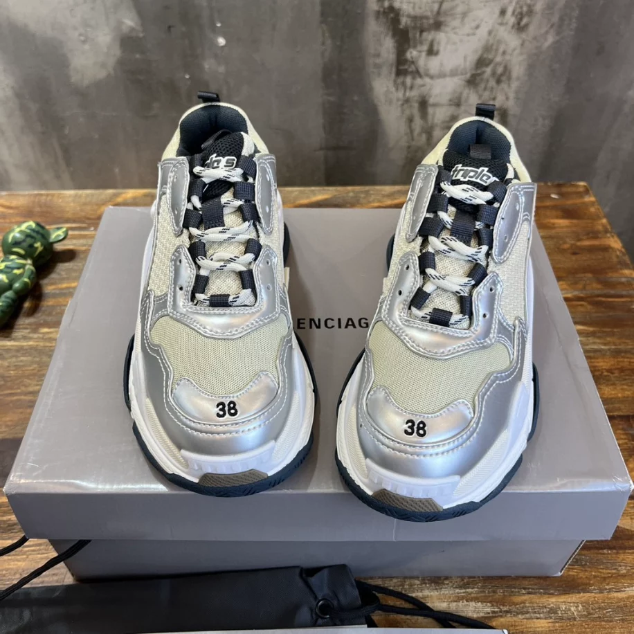 BALENCIAGA WOMEN'S TRIPLE S SNEAKER IN BLACK/WHITE/SILVER - BB256