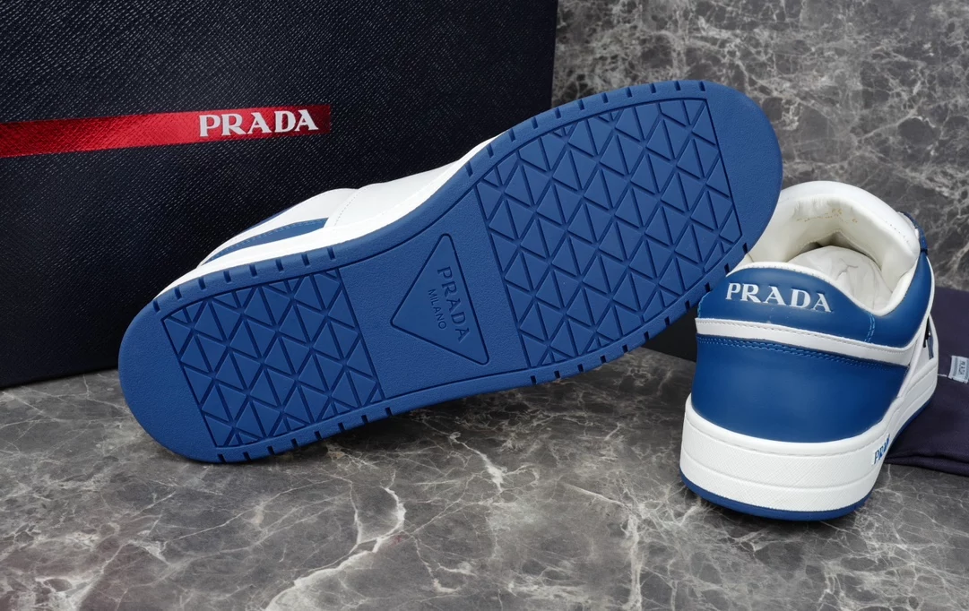 PRADA DOWNTOWN LEATHER SNEAKERS IN WHITE AND LACQUER BLUE- PRD011