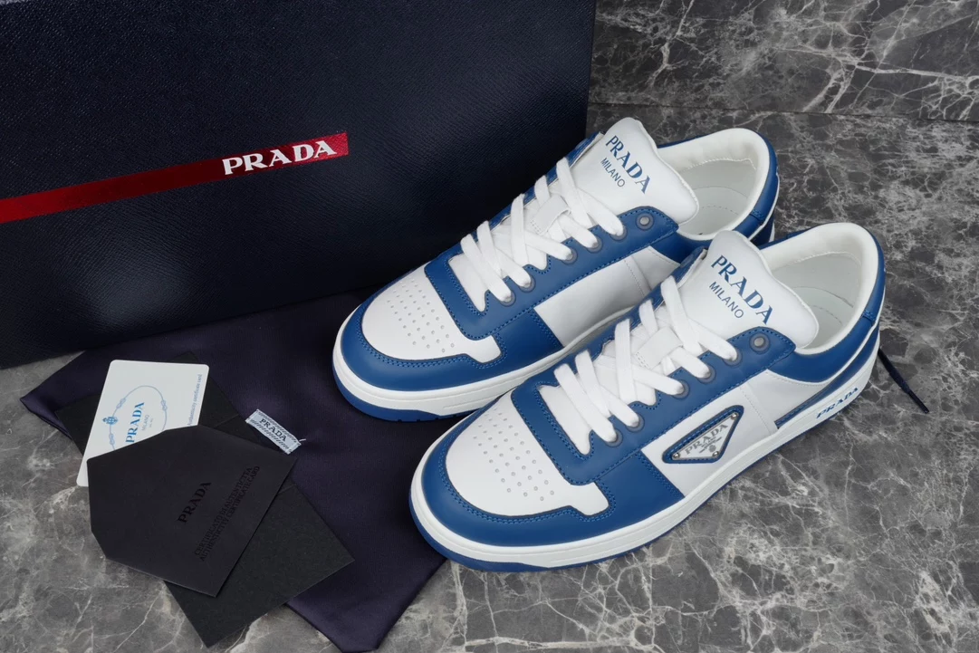 PRADA DOWNTOWN LEATHER SNEAKERS IN WHITE AND LACQUER BLUE- PRD011