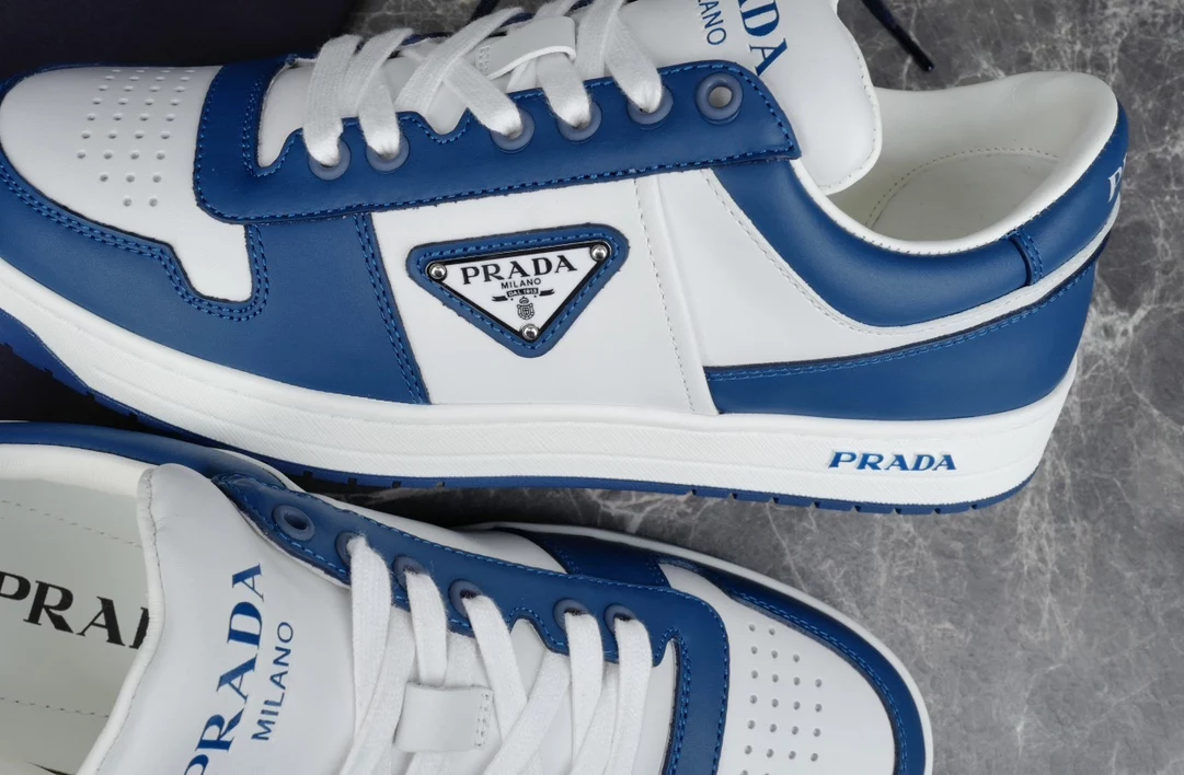 PRADA DOWNTOWN LEATHER SNEAKERS IN WHITE AND LACQUER BLUE- PRD011